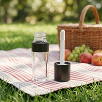 Tube de brillant à lèvres rond avec applicateur à grande brosse, emballage personnalisé en plastique pour gloss, conteneur cosmétique vide anti-fuite
