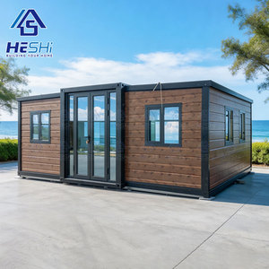 Heshi บ้านคอนเทนเนอร์ทรงสี่เหลี่ยมผืนผ้าพร้อมประตูกระจกและหน้าต่างสำหรับใช้งานกลางแจ้ง - Product Image 1