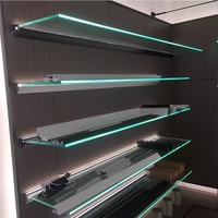 Vêtements de mode personnalisés pour magasins de détail Meubles de présentation murale en bois Étagère acrylique à LED Étagère de présentation murale à vendre