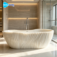Baignoire ovale autoportante en marbre massif, sculptée à la main, moderne et élégante, durable, pour une utilisation en salle de bain intérieure