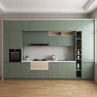 Cuisine modulaire verte sur mesure avec plan de travail en pierre artificielle pour appartement ou villa