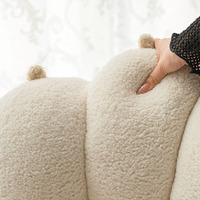 Fauteuil de salon ergonomique inclinable moderne en tissu Teddy crème moelleux, avec dossier en forme de patte de chat et détails griffes de chat, en bois