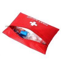 Petite trousse de premiers soins imperméable en nylon pour les voyages en plein air, avec logo personnalisé, certifiée CE, pour les situations d'urgence médicale et de survie