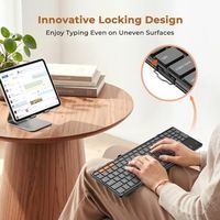 Clavier pliable OEM ODM avec pavé tactile, clavier Bluetooth, clavier numérique, clavier pliable portable pleine taille avec fonction multi-appareils B