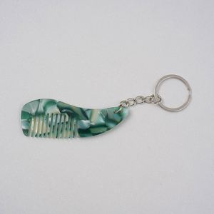 Nouvelle conception, peigne à cheveux portable mini-porte-clés antistatique mignon et élégant, plusieurs couleurs disponibles, vente en gros d'usine - Product Image 4