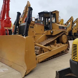 รถดันดิน CAT D9R สีเหลือง รถแทรกเตอร์ตีนตะขาบ Caterpillar อุปกรณ์หนัก เครื่องยนต์ 315 กิโลวัตต์ พร้อมชุดเกียร์ กำลังดัน 10 เมตร - Product Image 1