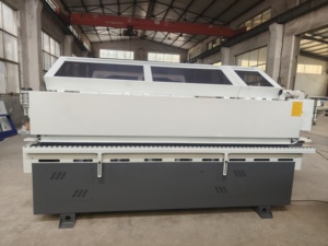 เครื่องปิดขอบไม้แบบอัตโนมัติ JUNDE รุ่น High Productivity 380V 6500W สำหรับงานตัดแต่งประตูไม้และตู้ไม้ - Product Image 2