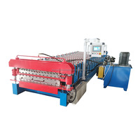 Machine à fabriquer des tuiles de toiture en acier coloré à double couche
