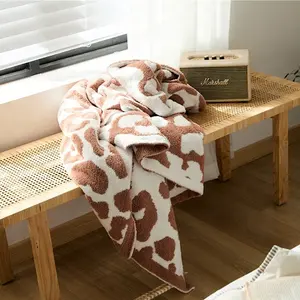 BWE top sell zero defect super soft 100% polyester microfiber feather yarn leopard zebra jacquard knit throw blanket