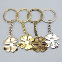 Porte-clés porte-bonheur à quatre feuilles gravé, en alliage de zinc, talisman pour la Saint-Patrick, cadeau pour hôtesse