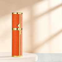 Pasokan Langsung Botol Parfum Kulit Berkualitas Tinggi 5ml Bentuk Silinder dengan Pompa Semprot dan Segel
