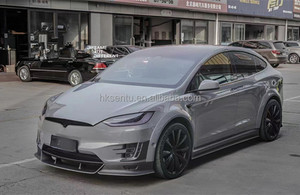 ชุดแต่งตัวถังรถยนต์ Tesla Model X ปี 2016-2018 คุณภาพสูง ผลิตจากคาร์บอนไฟเบอร์ ประกอบด้วยลิ้นหน้า สเกิร์ตข้าง ดิฟฟิวเซอร์หลัง และบังโคลน แบบยึดติดด้วยสกรู - Product Image 4
