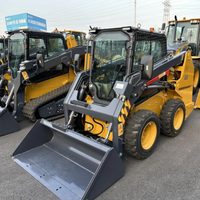 XC740K Compact Skid Steer Loader Wheel Loader Mesin Motor Gearbox Pompa yang Andal Kapasitas 750kg untuk Konstruksi dan Lanskap