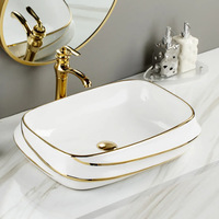 Lavabo en céramique dorée de luxe, lavabo moderne ovale à poser, lavabo pour les mains, hôtels, salles de bain, égouttoir en pierre de marbre