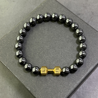 Bracelet en perles d'hématite avec breloque haltère dorée, bracelet extensible pour homme, idéal pour le sport et le fitness, cadeau quotidien