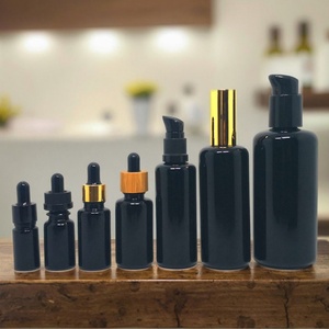 Botella de Vidrio Oscuro Violeta UV de 10ml 15ml 20ml 30ml 50ml 60ml 100ml con Tapas de Bomba de Plástico Negro y Logotipo Personalizado Serigrafiado - Product Image 1