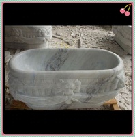 Baignoire moderne en marbre gris Carrara sculptée à la main, polissage haute brillance, autoportante, ovale, avec massage par jets d'air, écologique