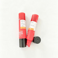 Emballage de tube souple personnalisé pour gloss et baume à lèvres cosmétiques avec embouts inclinés en PE/céramique/silicone/acier inoxydable