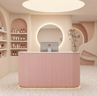 Bureau de réception moderne minimaliste incurvé avec espace de rangement pour salon ou bureau, design en MDF rose