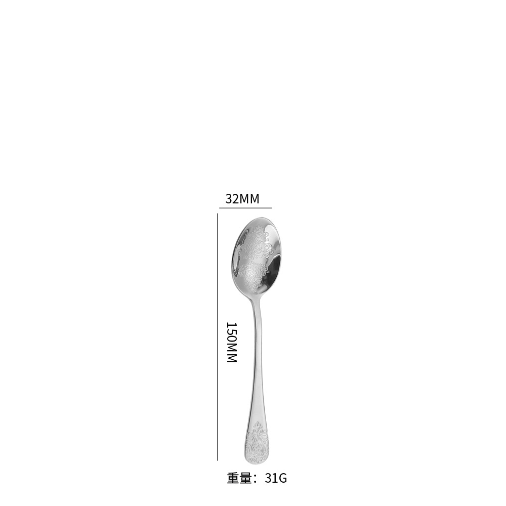 Cuchillo de mesa y cuchara de postre de plata.