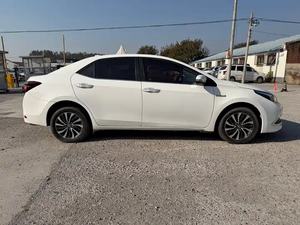 Voiture d'occasion <span class=keywords><strong>hybride</strong></span> <span class=keywords><strong>Corolla</strong></span> E-CVT à double moteur automatique, énergie nouvelle, conduite à gauche, intérieur foncé, en promotion - Product Image 4