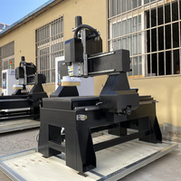 Machines 600*900mm changement d'outil automatique ATC 6090 routeur CNC avec table en fonte et réservoir d'eau