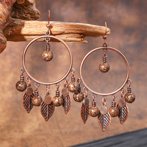 Pendientes colgantes de aleación de cobre chapados en bronce antiguo con diseño de atrapasueños para mujer, estilo bohemio, con plumas, joyería de moda - Product Image 4
