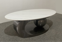 Table basse moderne minimaliste en pierre frittée blanche avec support en acier inoxydable pour salon