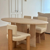 Table à manger ovale en travertin beige naturel, base découpée artistiquement, fabrication directe usine OEM ODM, pour salle à manger de villa moderne