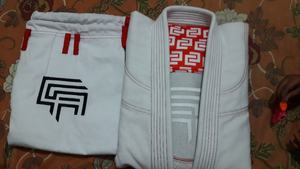 Gi BJJ personnalisé pour hommes Vente en gros de kimono Jiu Jitsu Gi brésilien Tissu léger pré-rétréci évacuant la sueur GI BJJ personnalisé pour hommes - Product Image 5