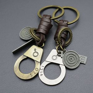 Handschellen-Schlüsselanhänger mit Lederband und Schlüsselring für Polizei-Akademie-Abschlussfeier - Product Image 1