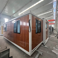 Maison conteneur moderne extensible 20 pieds/40 pieds préfabriquée entièrement meublée avec panneaux sandwich pour hôtel, bureau ou usage résidentiel compact