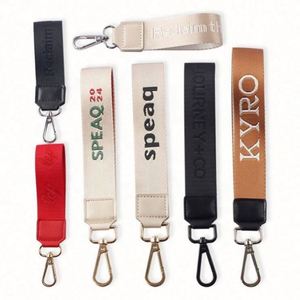 <b>Custom</b> Design Woven Embroidery Lulu Wrist Strap Key Lanyard Gift Promotional Branded Logo Leather <b>Keychain</b> - Product Image 1