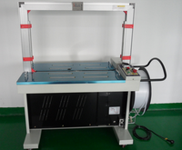 Machine d'emballage entièrement automatique pour la cerclage de cartons avec des courroies PP/PE de 5 mm, idéale pour la fixation de boîtes.