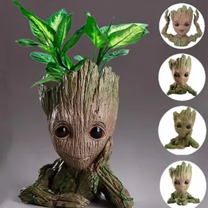 Popolare vaso di fiori in poliresina Cute Baby Groot Figurine Pen Pot Treeman Model Hands on The Chin Cute Green Plants Flowerpot