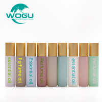 Bouteille d'emballage cosmétique rechargeable personnalisée 10ml couleur macaron huile essentielle parfum huile bouteille en verre avec boule à roulettes