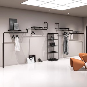 Estante <span class=keywords><strong>de</strong></span> exhibición para tienda <span class=keywords><strong>de</strong></span> ropa <span class=keywords><strong>de</strong></span> mujer, colgador <span class=keywords><strong>de</strong></span> pared multicapa negro <span class=keywords><strong>de</strong></span> hierro Simple, estilo moderno, el mejor uso minorista en línea - Product Image 1