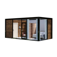 Maison conteneur préfabriquée de luxe moderne 40 pieds, structure en acier, mini-appartement, salle de bain, mur en verre, entièrement meublée, modulaire