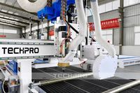 Machine de découpe CNC à emboîtement automatique avec fonction de changement d'outils automatique pour le travail du bois