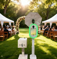 Photomaton ovale moderne réglable en hauteur compatible avec les appareils photo reflex et les iPad, avec support d'imprimante