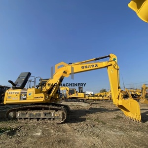 รถขุดไฮดรอลิกแบบตีนตะขาบ Komatsu PC210 มือสอง ขนาด 21 ตัน พร้อมหัวเจาะดิน ความจุบุ้งกี๋ 1.2 เมตร  พร้อมเครื่องยนต์ เกียร์ และมอเตอร์ - Product Image 1
