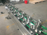 Convoyeur à tasses inclinées en acier inoxydable de type Z Focus Machinery, vitesse réglable pour les snacks et les fruits secs