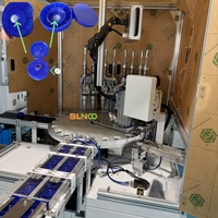 Machine d'assemblage de bouchons avec silicone de repassage pour bouteilles