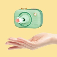 Vibrateur en forme d'appareil photo avec 5 modes de succion, étanche IPX6, en silicone liquide, rechargeable par USB pour femmes