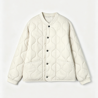 Veste matelassée légère unisexe en gros, style 'Onion', avec boutons, poignets côtelés et poches plaquées, vêtement d'extérieur chaud et décontracté pour l'hiver
