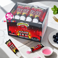 Forme de dentifrice confiture aigre bonbons liquides ODM bonbons personnalisés saveur fruitée presser acide confiture gelée liquide bonbons