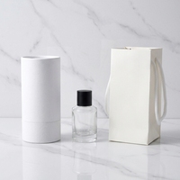 Vente en gros de flacons de parfum en verre vides de haute qualité, 50 ml, avec boîte cadeau blanche et sac en papier