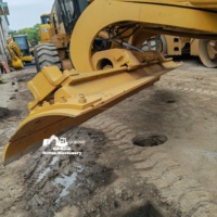 Niveleuse à moteur d'occasion CAT 140K 16T avec moteur puissant et système hydraulique fiable pour la construction routière, le nivellement et les travaux de terrassement