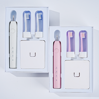 Brosse à dents électrique programmable avec 3 modes pour éliminer efficacement la plaque dentaire, livrée avec 2 têtes de brosse pour un usage domestique