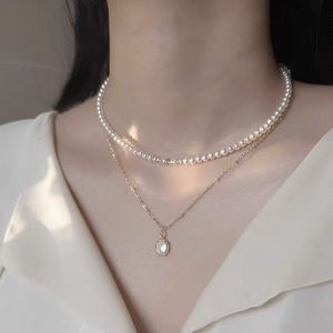 Collier de perles à motifs blancs populaires 2024, pendentif diamant clouté de flocon de neige en argent, design unique et délicatesse élégante - Product Image 6